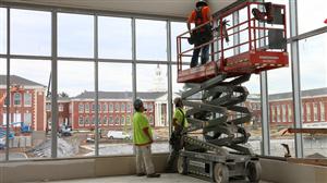 Gym window with workers lif 